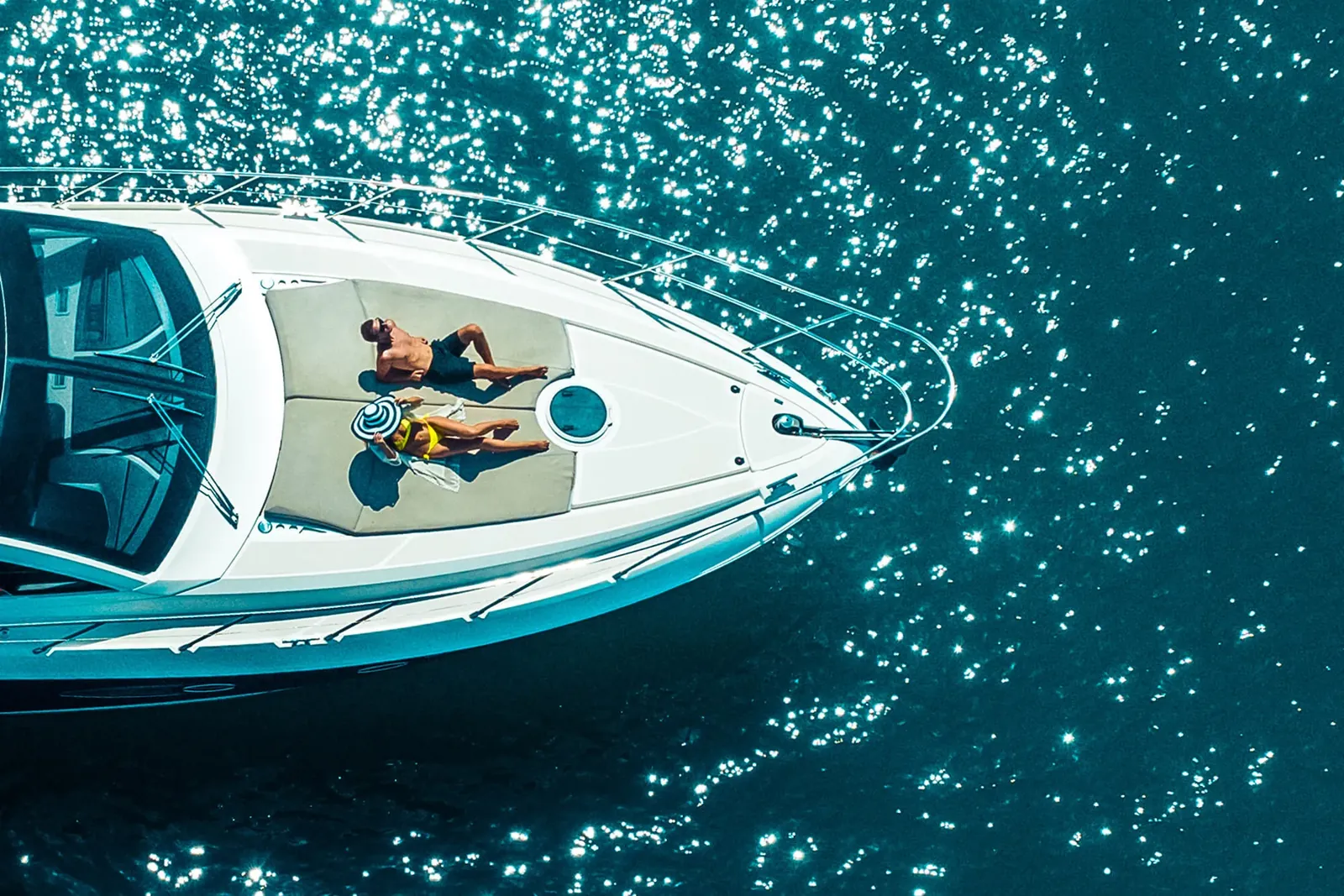 Couple on a luxury yacht charter off Marbella